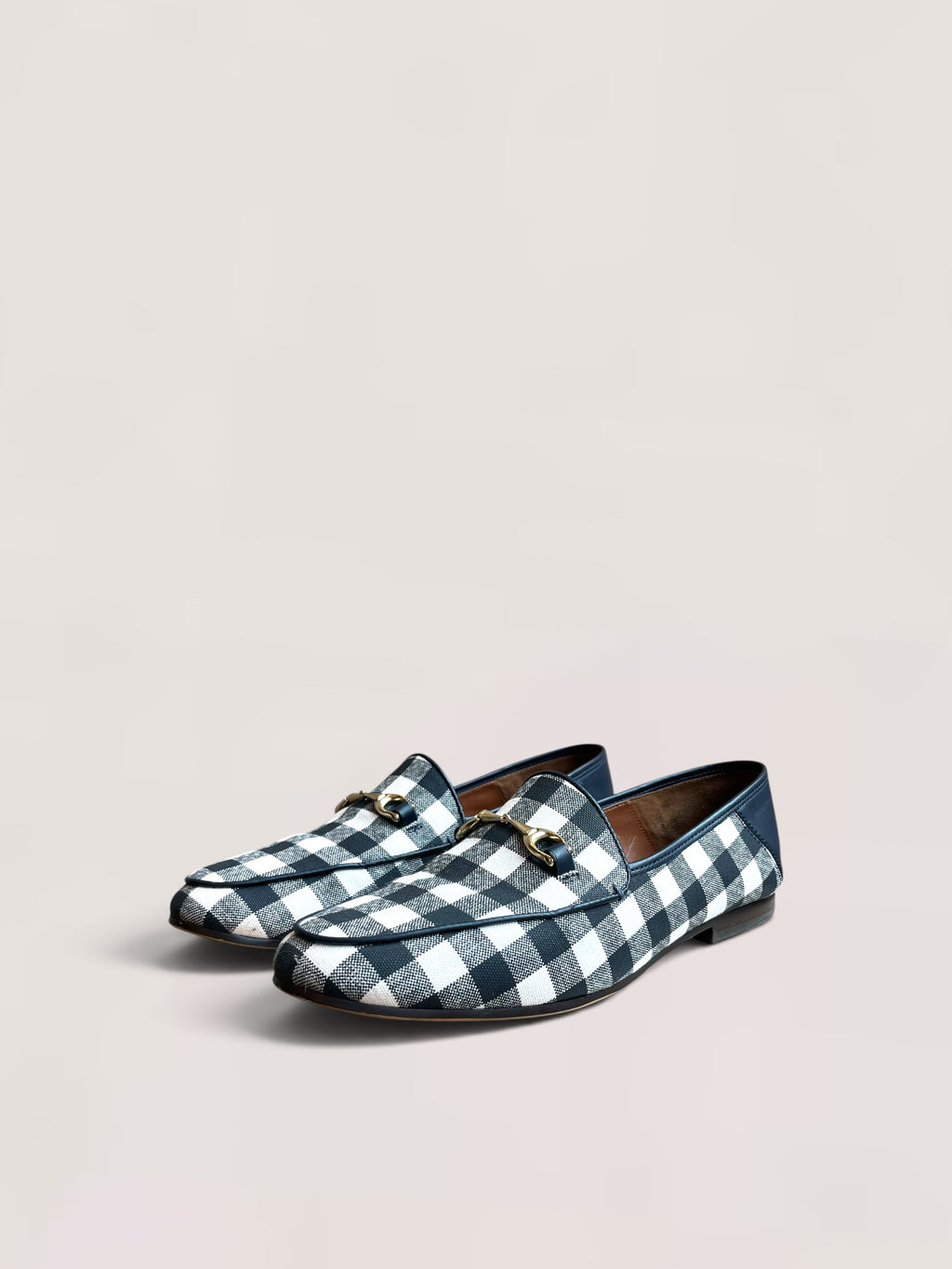 Black and white checked Coach loafers